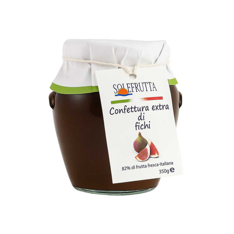 Jar of fig jam with a white label on a white background