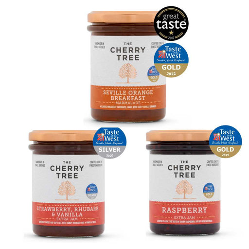 Three jars of 'The Cherry Tree' jam with awards on a white background