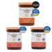 Three jars of 'The Cherry Tree' jam with awards on a white background