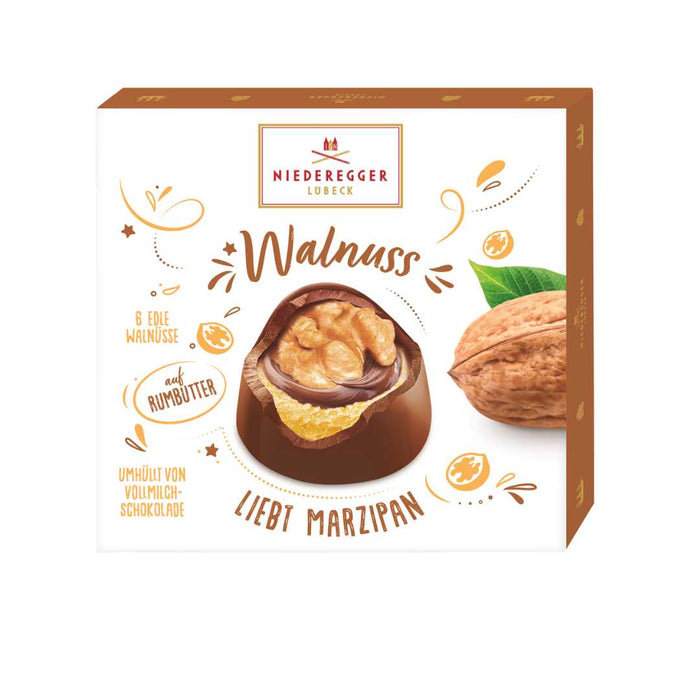 Niederegger chocolate box with a walnut truffle and brand logo on a white background
