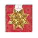 Gold star-shaped marzipan pieces in a red box with Niederegger branding.
