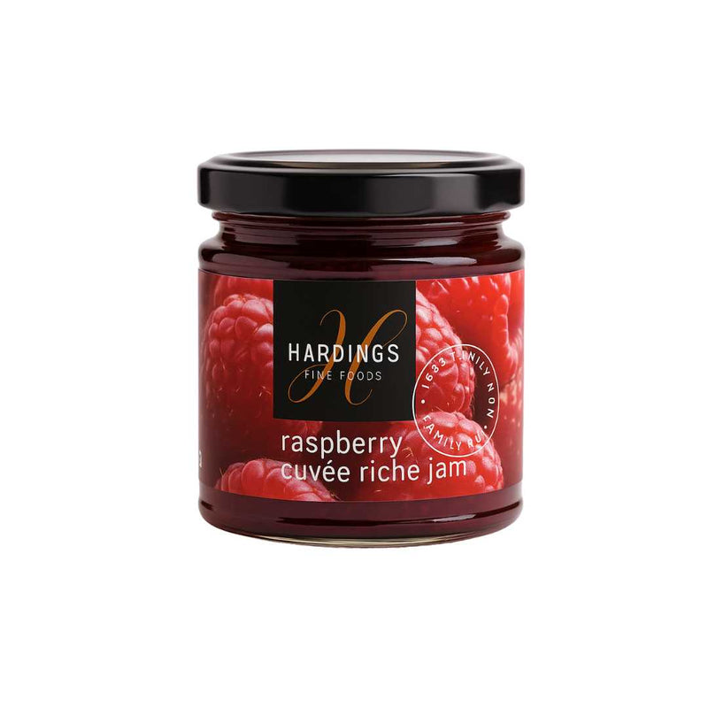 Jar of Hardings Raspberry Cuveé Riche Jam on a white background