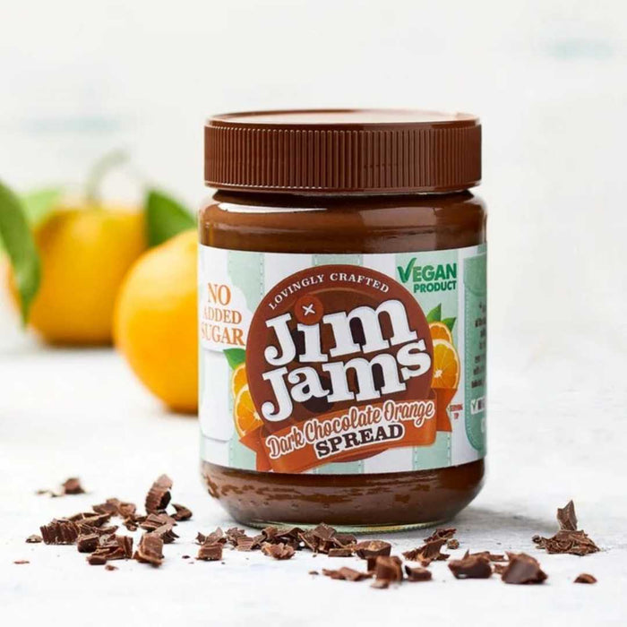 Jar of Jim Jam's Dark Chocolate Orange Spread with lemons in the background
