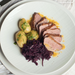 Roast duck with red cabbage and potatoes